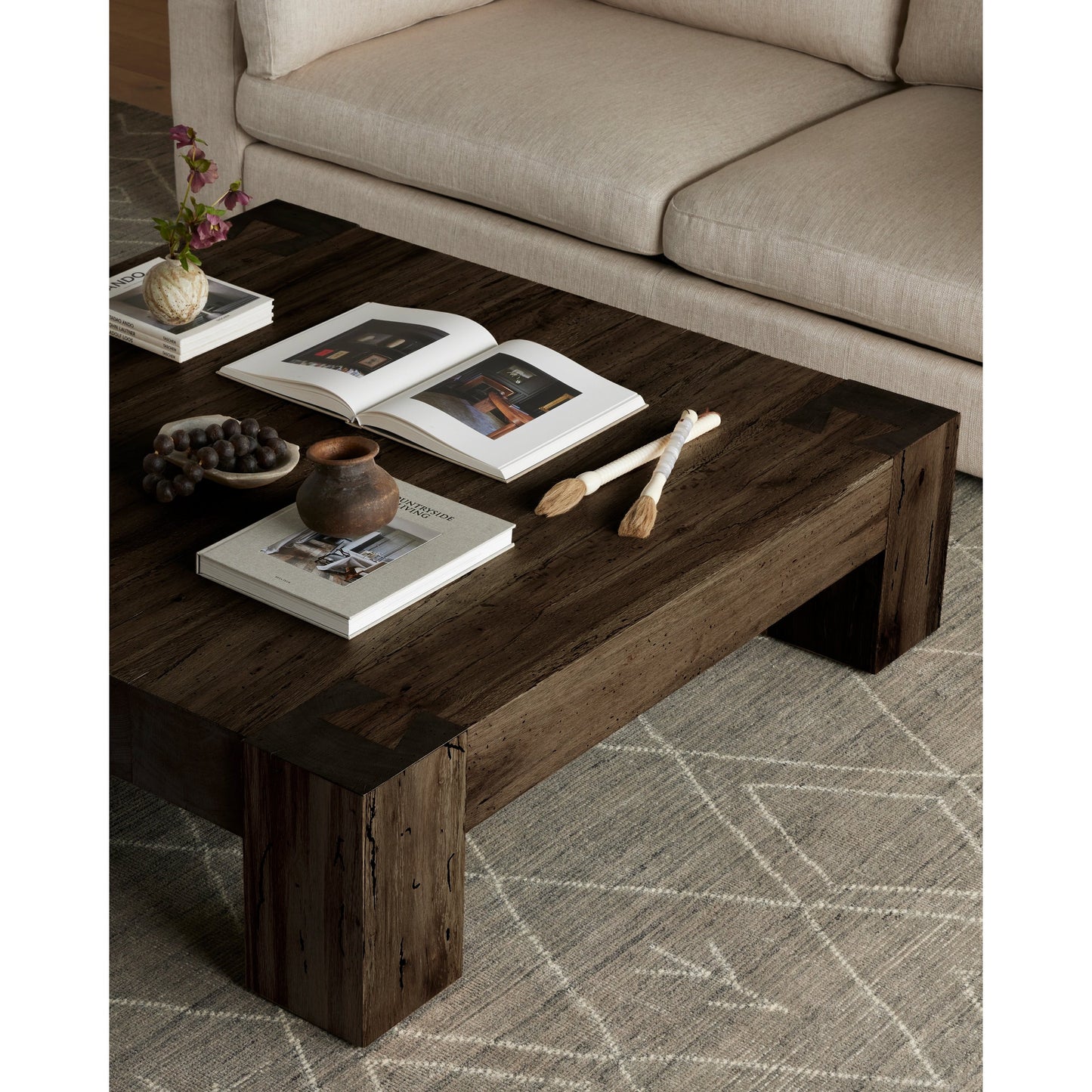 010 SI-1976980 | Lifestyle | Abaso Coffee Table by Four Hands in ebony rustic wormwood oak. Made from thick oak veneer, engineered hardwood in a transitional style.