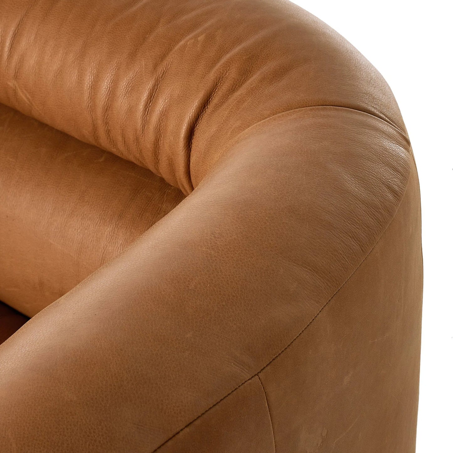 008 SI-2320068 | Closeup | Gerrie Swivel Chair by Four Hands in brickhouse butterscotch. Made from top grain leather in a unique style.