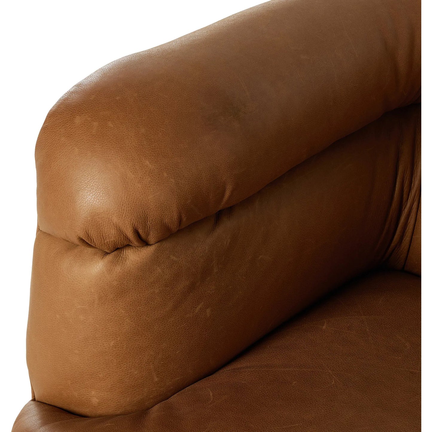010 SI-2320068 | Closeup | Gerrie Swivel Chair by Four Hands in brickhouse butterscotch. Made from top grain leather in a unique style.