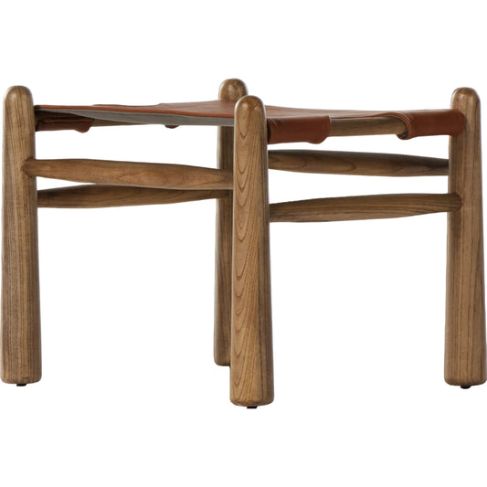 Nino Ottoman by Four Hands in dakota tobacco. Made from top grain leather, solid nettlewood, 100% polyester in a modern style.