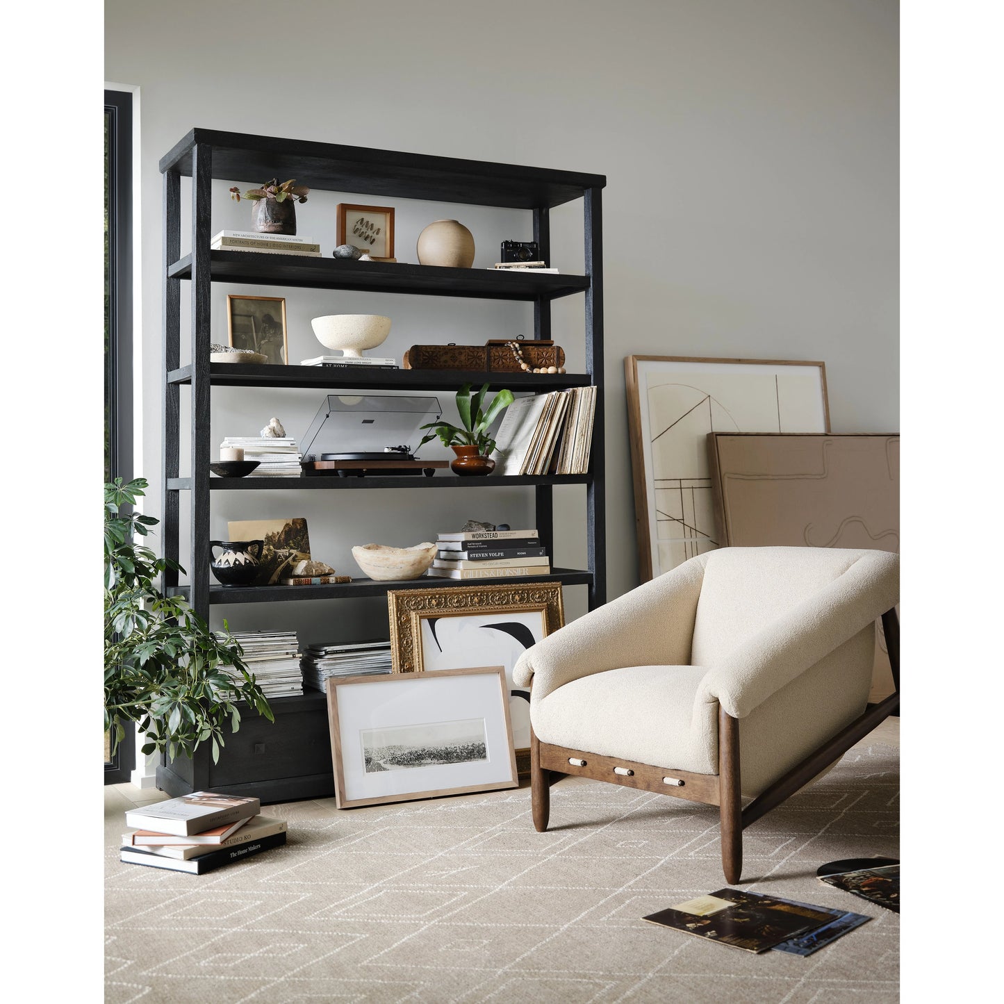 012 SI-1902932 | Lifestyle | Woodmore Bookcase by Four Hands in dark totem, black iron and dark totem. Made from solid mixed reclaimed wood, iron in a transitional style.