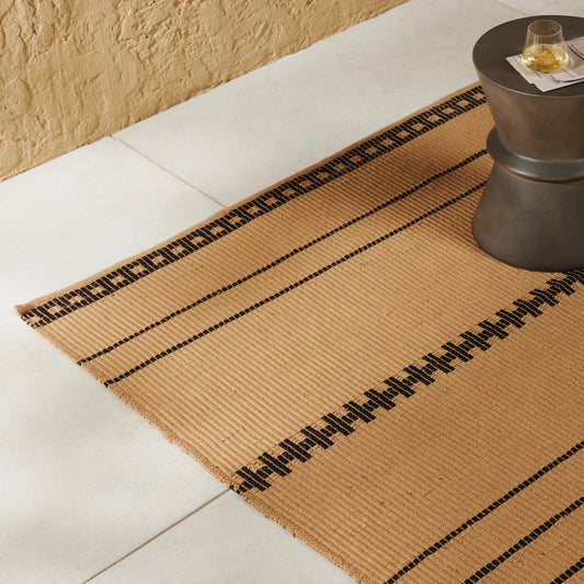 Vallarta Outdoor Rug by Four Hands in valley sand. Made from 100% polyethylene terephthalate (pet) in a modern style.