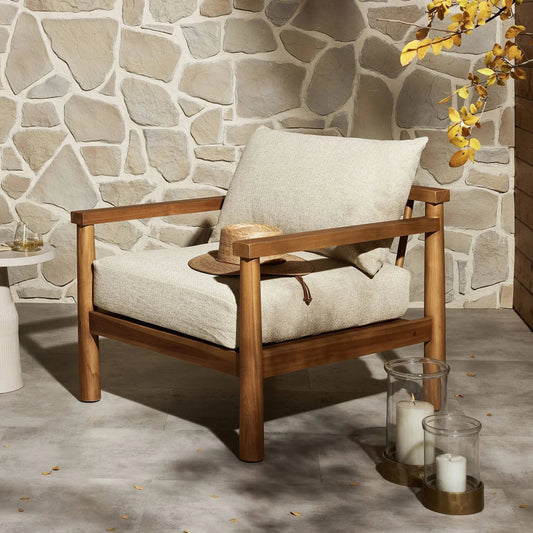 Irvine Outdoor Chair by Four Hands in hayes cream and natural teak. Made from 100% olefin, solid teak, 59% polyurethane foam, 30% polyester fiber, 11% polyester fiber batting in a modern style.