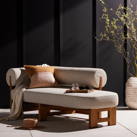 Malta Outdoor Chaise by Four Hands in faye sand. Made from 100% olefin, solid fsc®-certified teak, 91% polyurethane foam pad, 9% polyester fiber batting in a modern style.