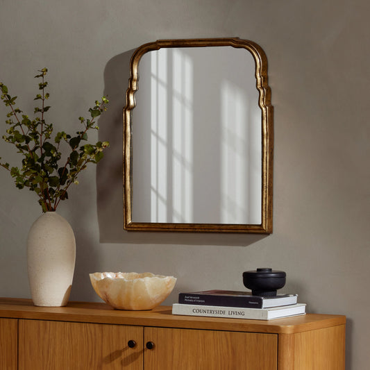 Loire Mirror by Four Hands in antiqued gold leaf. Made from aluminum, mirror, engineered hardwood in a traditional style.