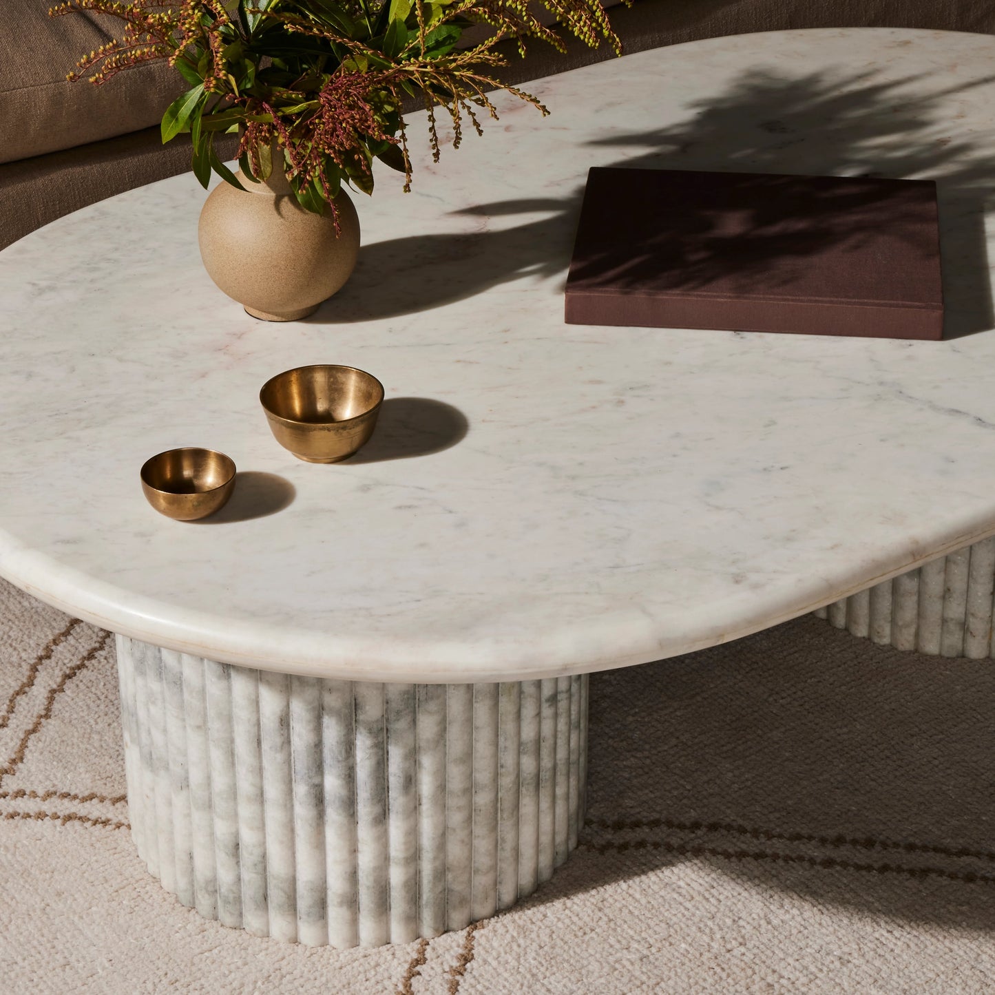 020 SI-1977645 | Lifestyle | Oranda Coffee Table by Four Hands in polished white marble. Made from solid marble, engineered hardwood in a modern style.