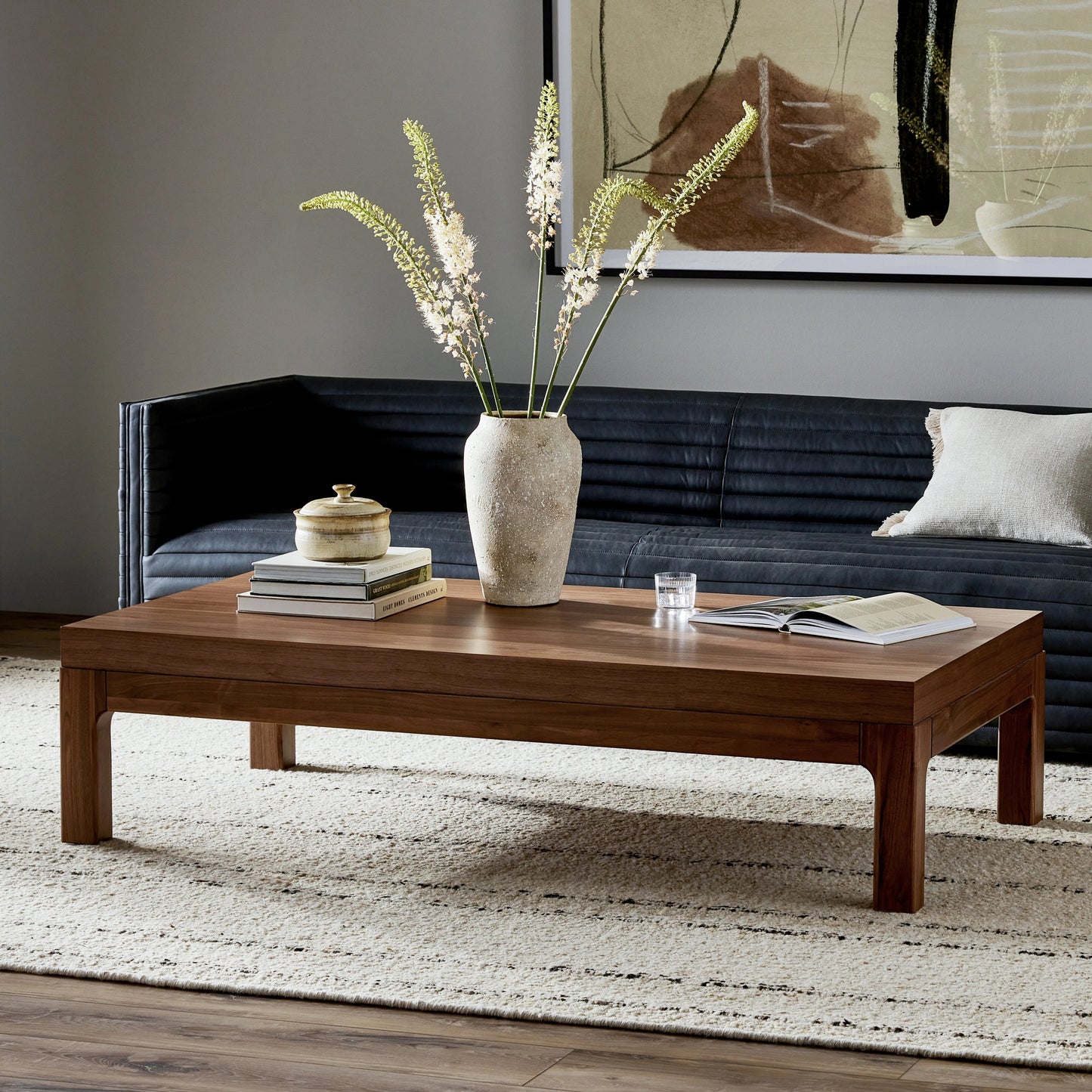 012 SI-2074083 | Lifestyle | Arturo Coffee Table by Four Hands in natural walnut. Made from walnut veneer, solid walnut in a modern style.