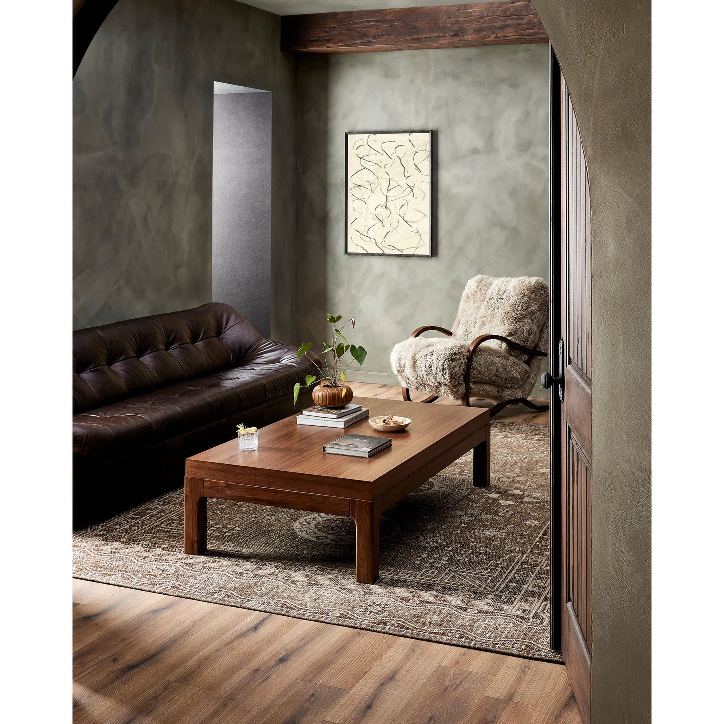 013 SI-2074083 | Lifestyle | Arturo Coffee Table by Four Hands in natural walnut. Made from walnut veneer, solid walnut in a modern style.