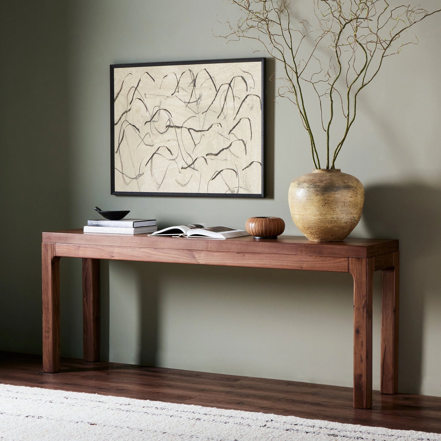 011 SI-2074084 | Lifestyle | Arturo Console Table by Four Hands in natural walnut. Made from walnut veneer, solid walnut in a modern style.