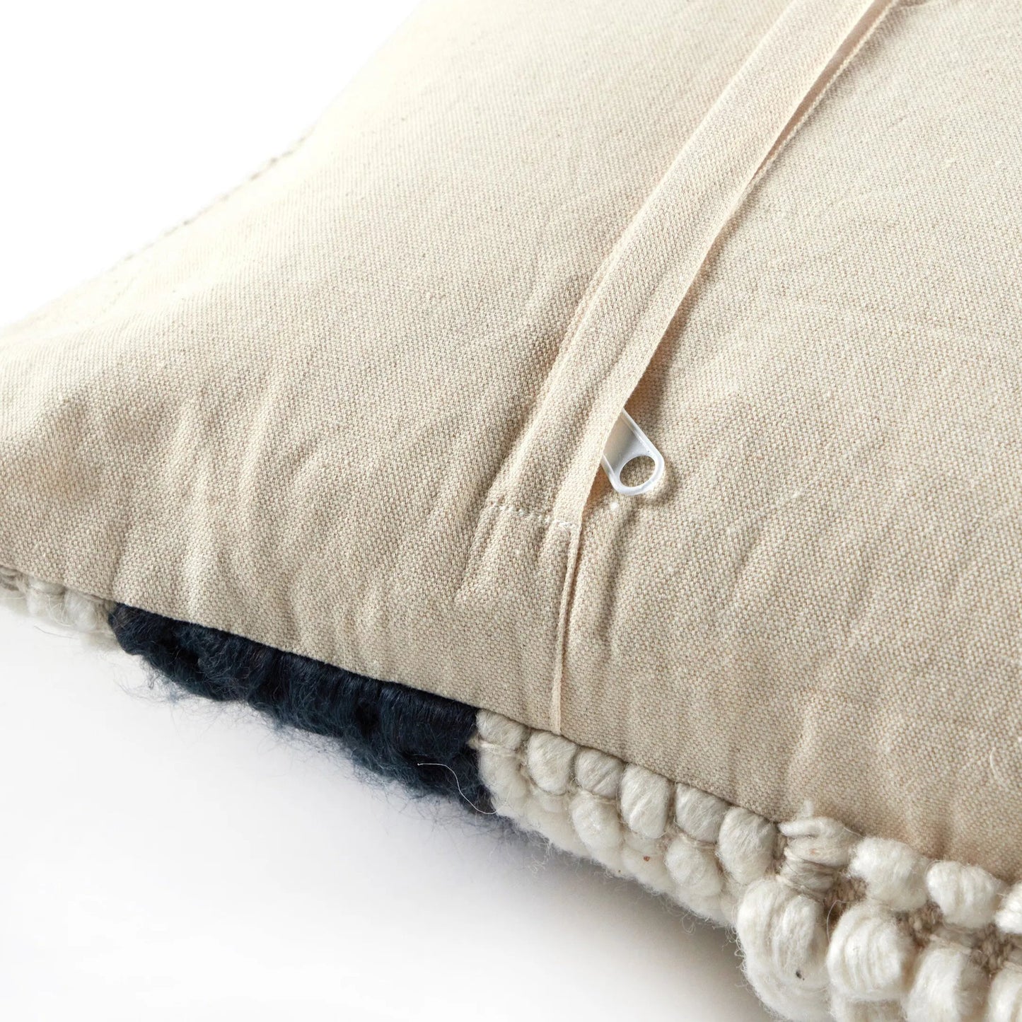 005 SI-2257067 | Closeup | Textured Stripe Pillow by Four Hands in navy, natural, cream backing. Made from 60% wool, 30% cotton, 10% viscose, 100% cotton, 100% polyester fiber in a unique style.