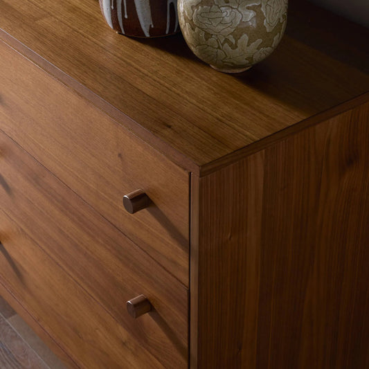 Arturo 9 Drawer Dresser by Four Hands in natural walnut veneer. Made from walnut veneer, solid walnut in a transitional style.