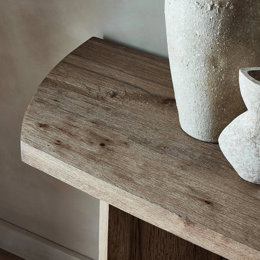 Brinton Console Table by Four Hands in rustic oak. Made from thick oak veneer, engineered hardwood in a modern style.