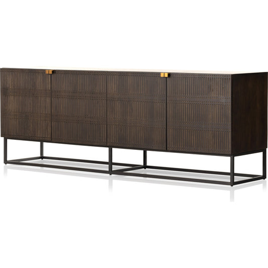 Kelby Closed Media Console by Four Hands in aged brass, carved vintage brown, vintage brown, gunmetal. Made from solid mango, iron in a modern style.