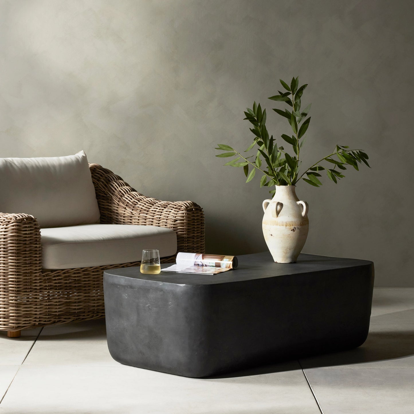 016 SI-1977068 | Lifestyle | Basil Outdoor Rectangular Coffee Table by Four Hands. Made from aluminum in a modern style.