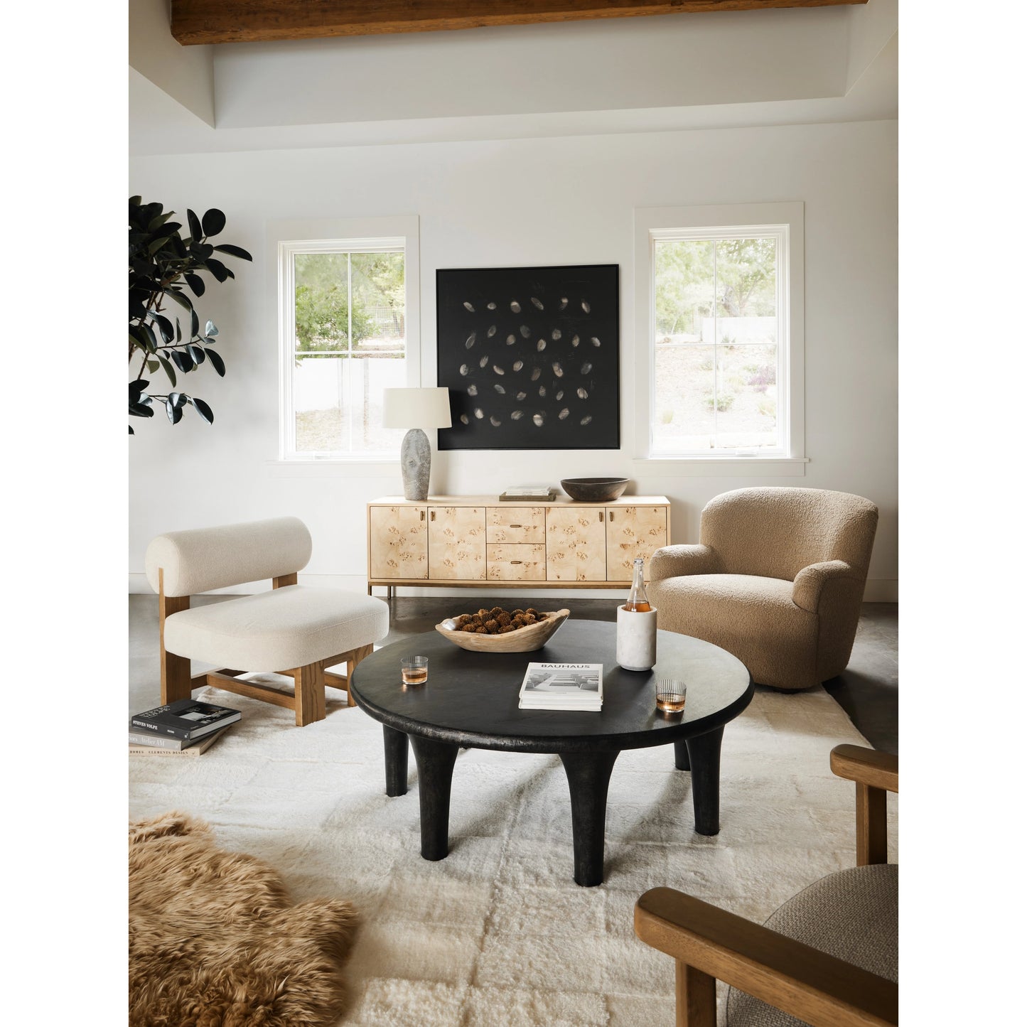 023 SI-1902884 | Lifestyle | Kadon Chair by Four Hands in sheepskin camel, almond. Made from 100% polyester, solid parawood, 100% polypropylene in a transitional style.