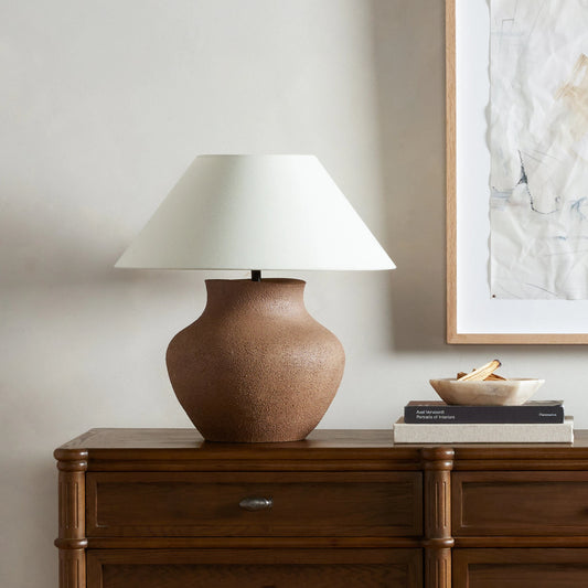 Parma Ceramic Table Lamp by Four Hands in dark sand. Made from ceramic, 65% polyester, 35% flax, linen, thermoplastic in a modern style.