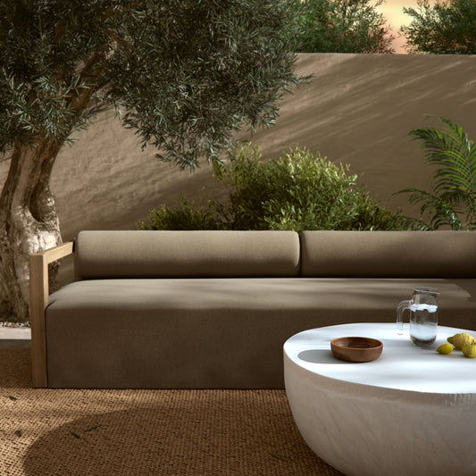 Laskin Outdoor Sofa by Four Hands in alessi fawn and washed brown. Made from 100% polypropylene, solid fsc®-certified teak, 91% polyurethane foam pad, 9% polyester fiber batting in a modern style.
