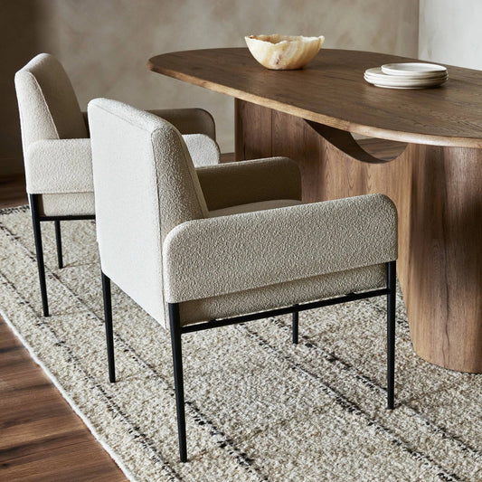 Brickel Dining Armchair by Four Hands in light taupe. Made from 100% polyester, iron, 93% polyurethane foam pad, 7% polyester fiber batting in a modern style.