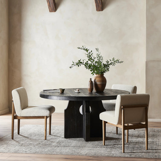 Allandale Round Dining Table by Four Hands. Made from solid reclaimed elm, poplar eucalyptus plywood in a modern style.