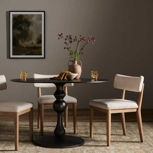 Daffin Round Bistro Table by Four Hands in black antique. Made from aluminum in a modern style.