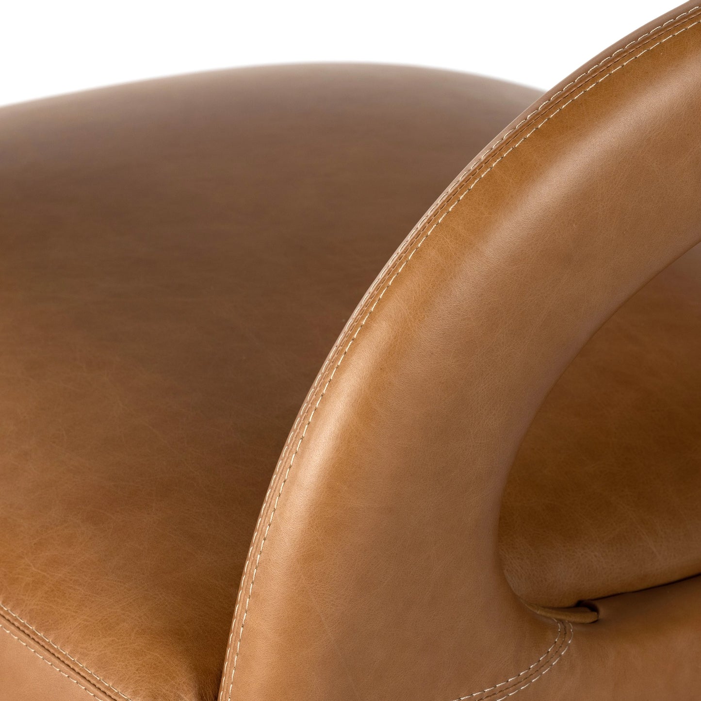 007 SI-1980425 | Additional Silo | Hawkins Swivel Chair by Four Hands in sonoma butterscotch. Made from top grain leather, poplar plywood, 100% polyester in a modern style.