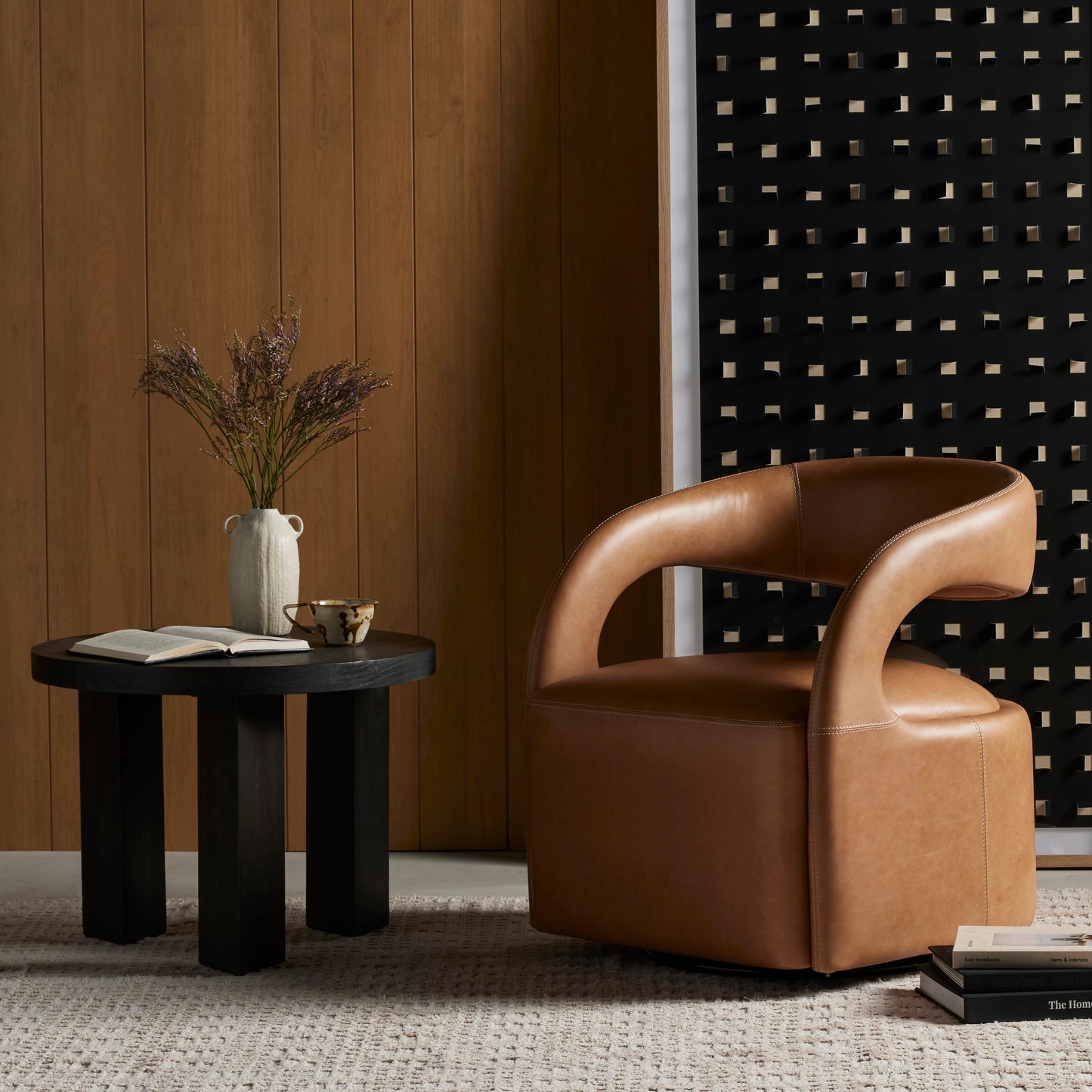 021 SI-1980425 | Lifestyle | Hawkins Swivel Chair by Four Hands in sonoma butterscotch. Made from top grain leather, poplar plywood, 100% polyester in a modern style.