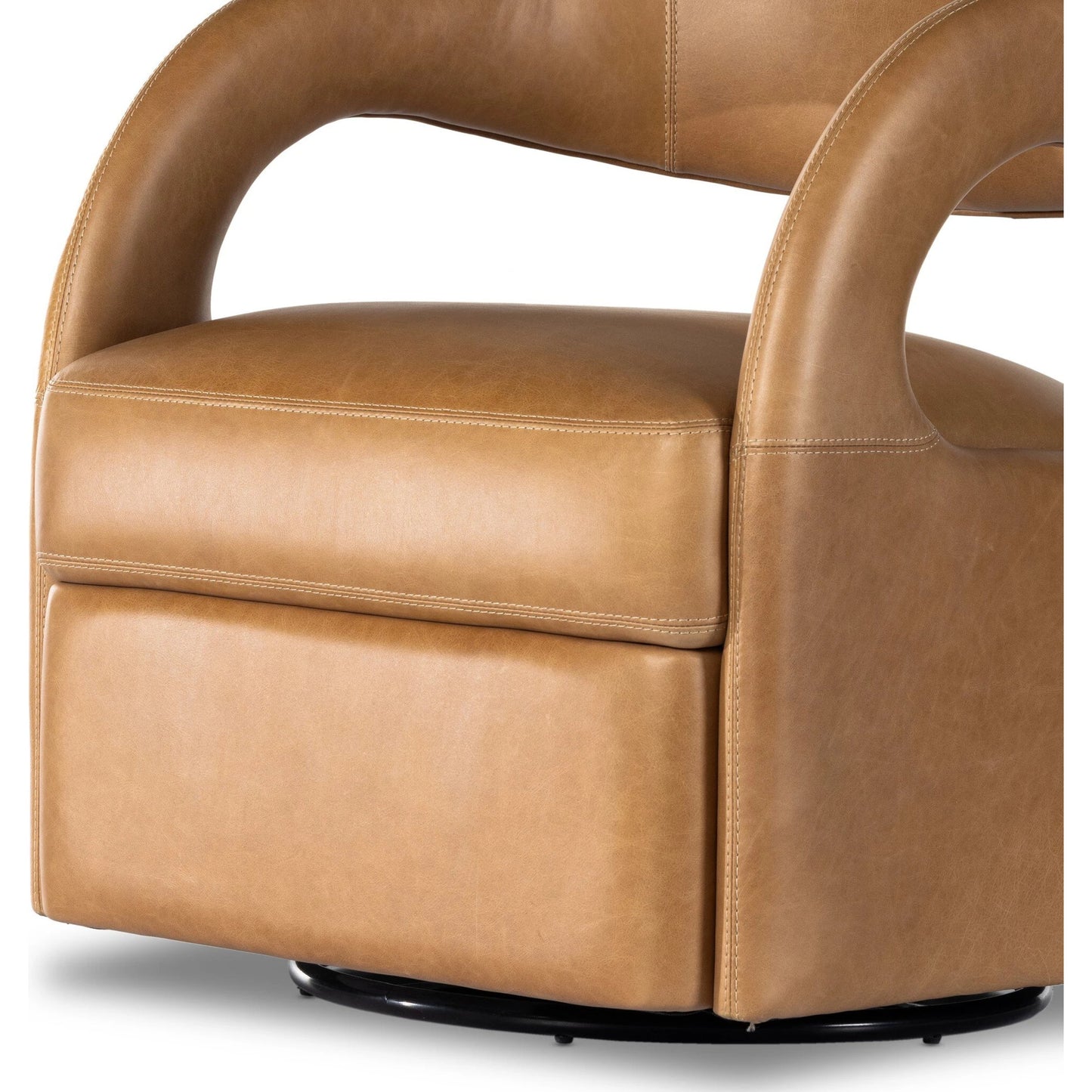 020 SI-1980425 | Closeup | Hawkins Swivel Chair by Four Hands in sonoma butterscotch. Made from top grain leather, poplar plywood, 100% polyester in a modern style.