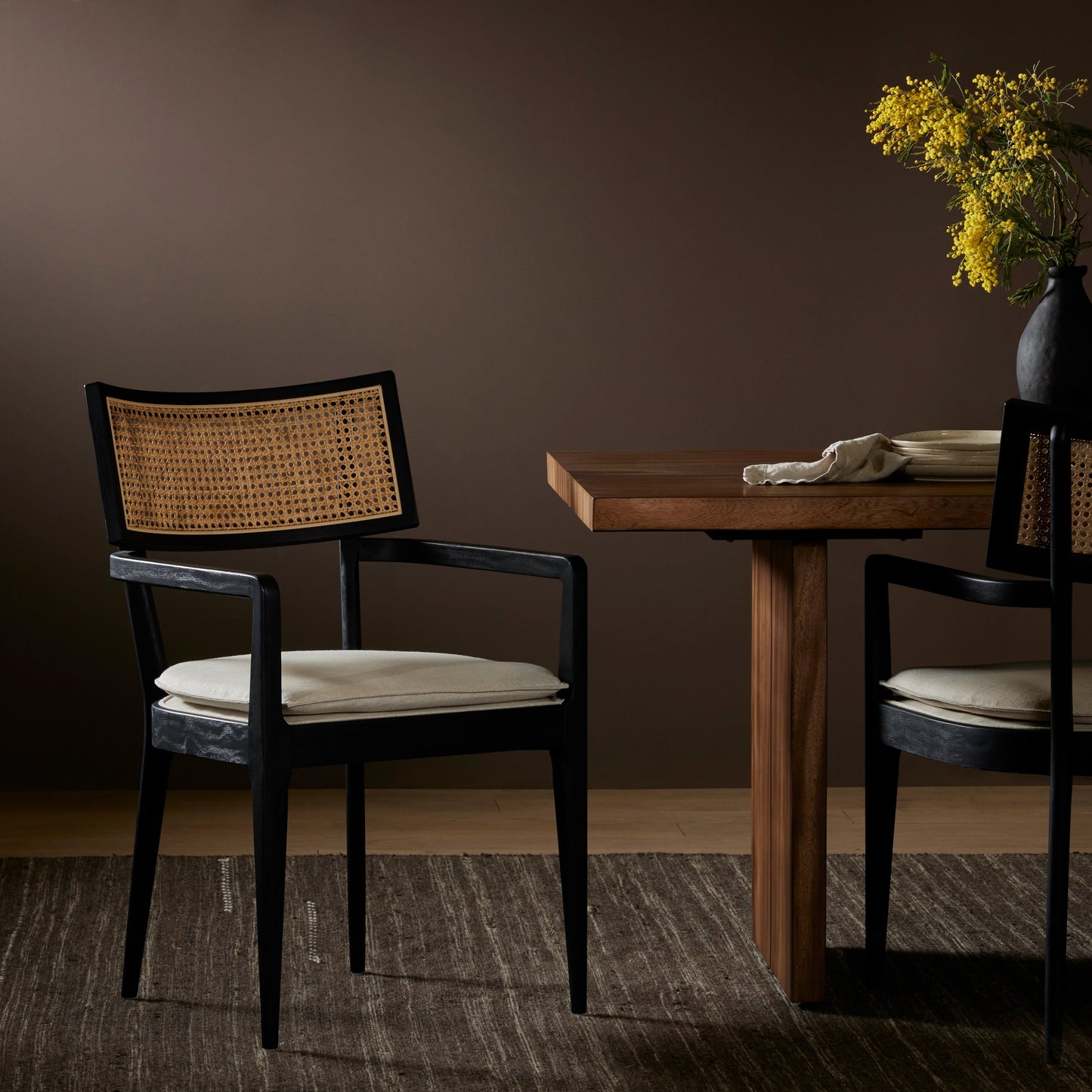 020 SI-1977128 | Lifestyle | Britt Dining Armchair by Four Hands. Made from 92% polyester, 8% flax, linen, solid nettlewood, cane in a modern style.