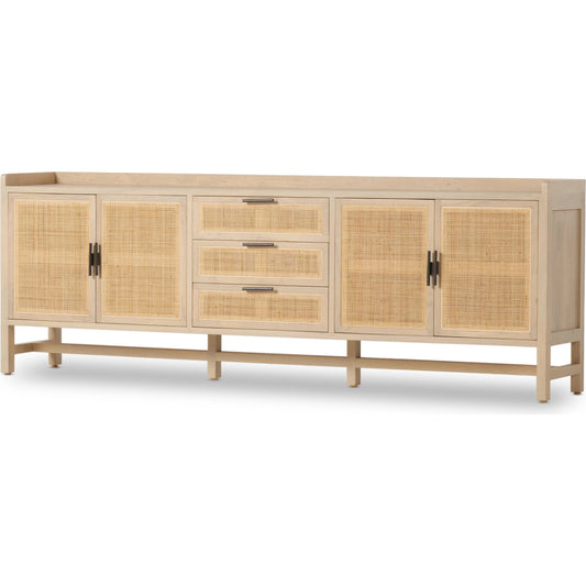 Caprice 96" Sideboard by Four Hands in natural mango. Made from solid mango, iron, cane in a modern style.