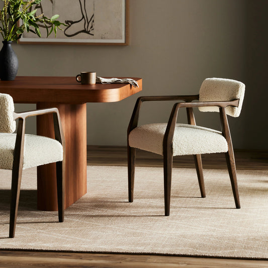 Tyler Dining Armchair by Four Hands. Made from 100% polyester, solid oak in a modern style.
