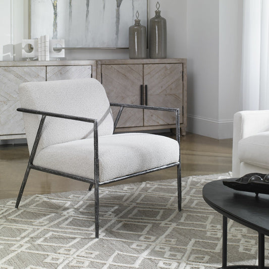 Brisbane Chair by Uttermost in ivory, gray and charcoal. Made from cast iron, mdf, foam, fabric in a transitional style.