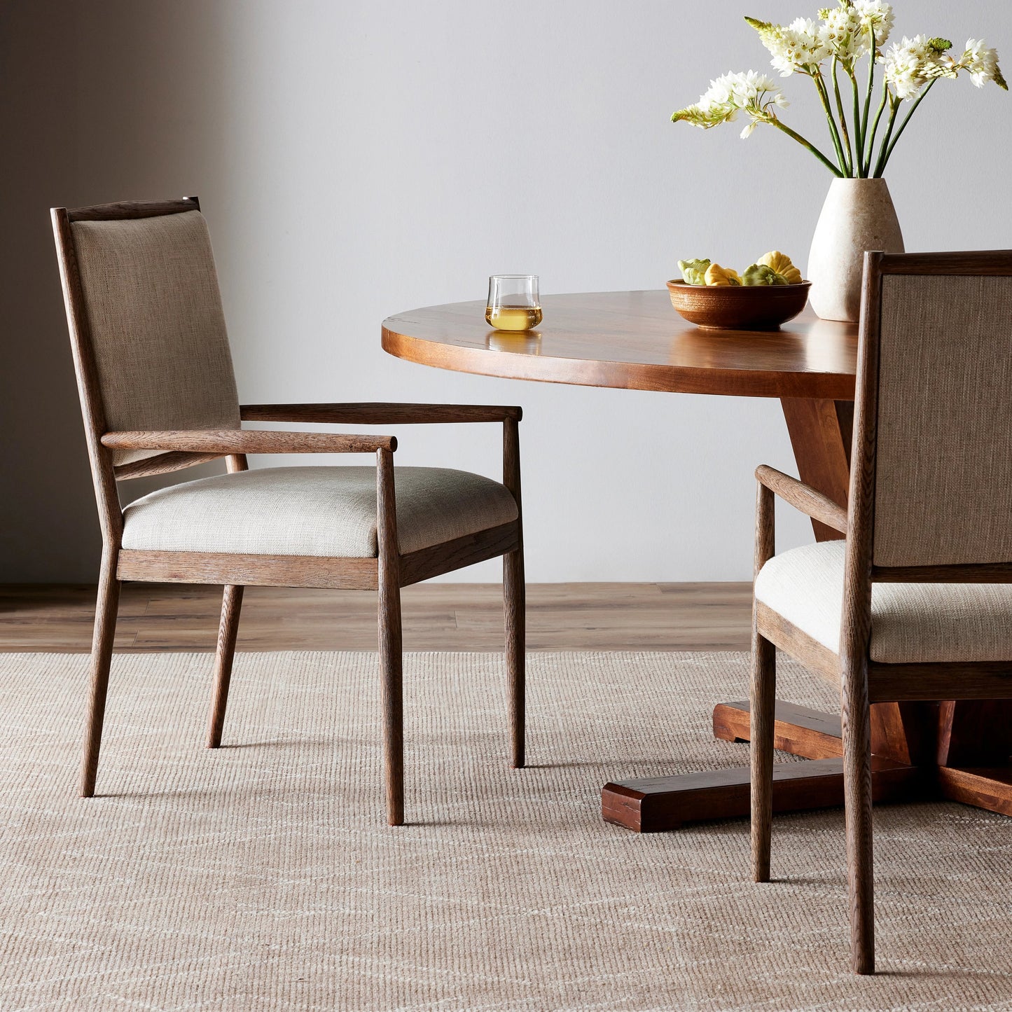 012 SI-2074330 | Lifestyle | Glenview Dining Armchair by Four Hands in essence natural, weathered oak. Made from 49% viscose (rayon), 22% flax, linen, 18% polyester, 11% cotton, solid oak in a modern style.