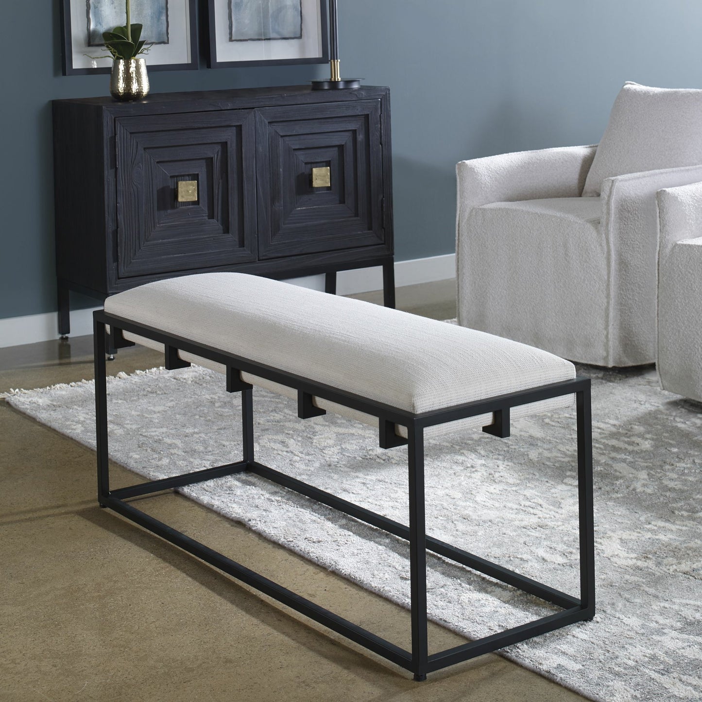 006 SI-1789789 | Lifestyle | Paradox Bench by Uttermost in matte black. Made from iron, mdf, polyester, foam in a transitional style.
