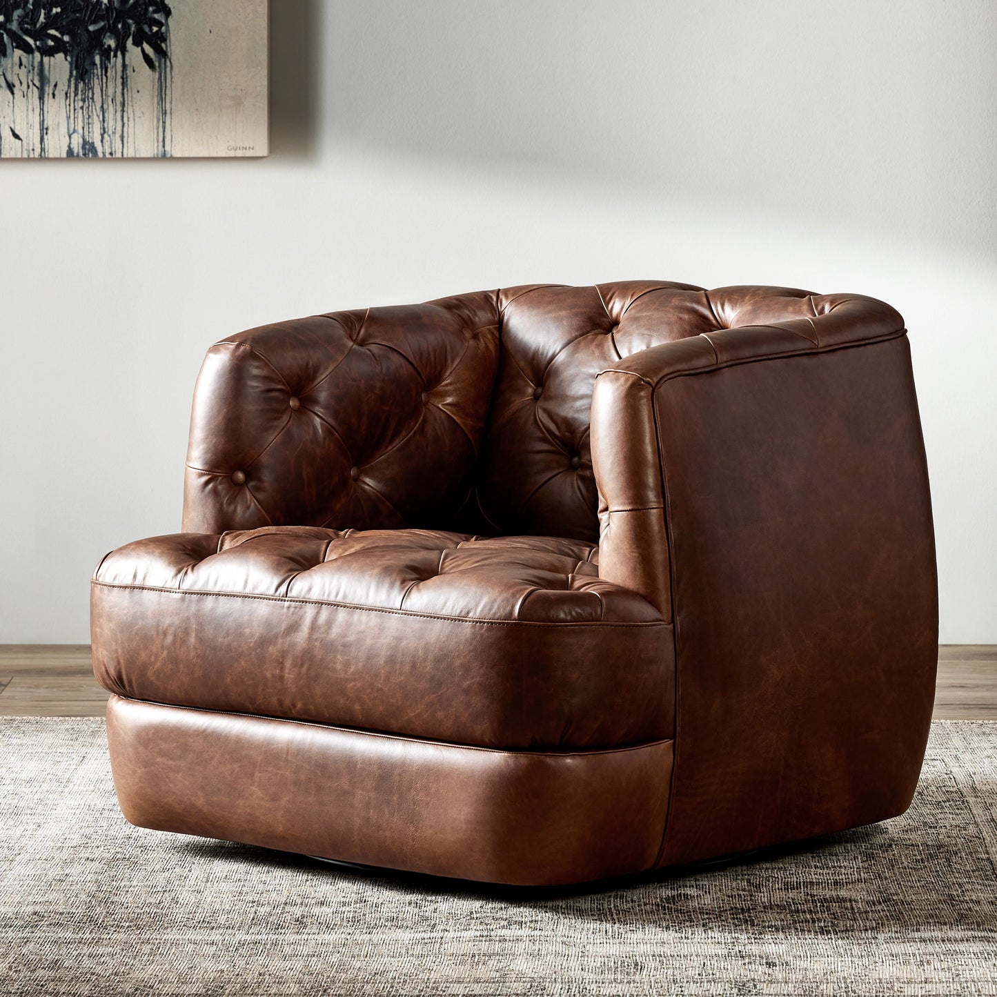 013 SI-2074573 | Lifestyle | Paul Swivel Chair by Four Hands in raleigh cigar. Made from top grain leather, poplar plywood, 100% polyester in a modern style.