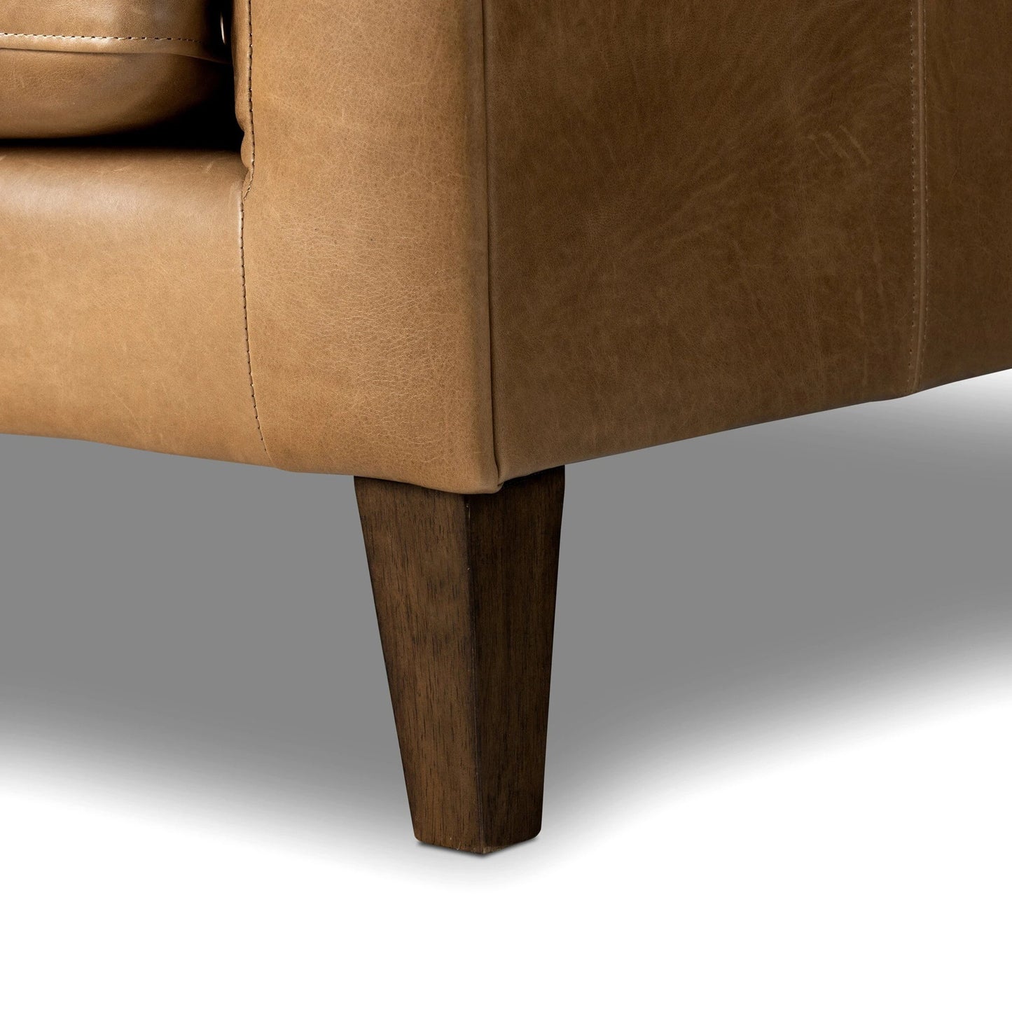 010 SI-2137648 | Closeup | Thurston Sofa by Four Hands in dakota warm taupe and almond. Made from top grain leather, solid parawood, solid poplar in a modern style.
