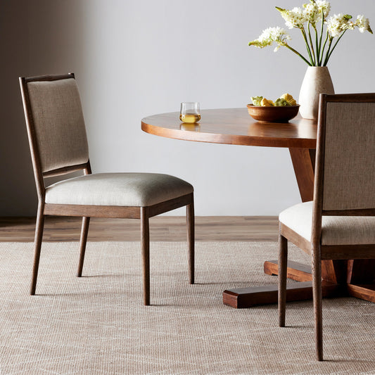 Glenview Dining Chair by Four Hands in essence natural and weathered oak. Made from 49% viscose (rayon), 22% flax, linen, 18% polyester, 11% cotton, solid oak in a modern style.