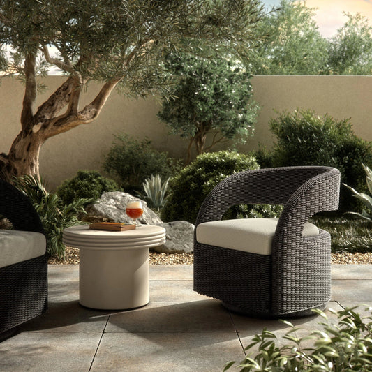 Hawkins Outdoor Swivel Chair by Four Hands. Made from 100% olefin, 100% polyethylene, 91% polyurethane foam pad, 9% polyester fiber batting in a modern style.