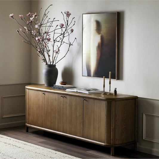 Florent Sideboard by Four Hands in amber oak, amber oak thin veneer. Made from solid oak, oak veneer in a traditional style.
