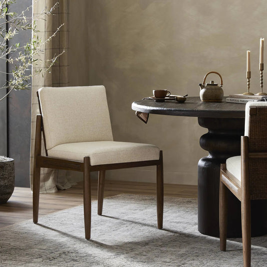 Costera Dining Chair by Four Hands in antwerp natural, almond, vintage cross woven cane. Made from 39% linen, 35% cotton, 26% polyester, solid parawood, cane in a transitional style.