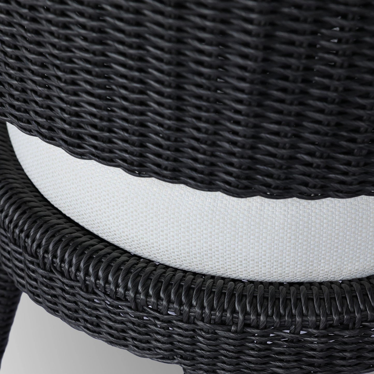 023 SI-2137371 | Closeup | Hawkins Outdoor Dining Chair by Four Hands. Made from 100% olefin, aluminum, 100% polyethylene in a modern style.