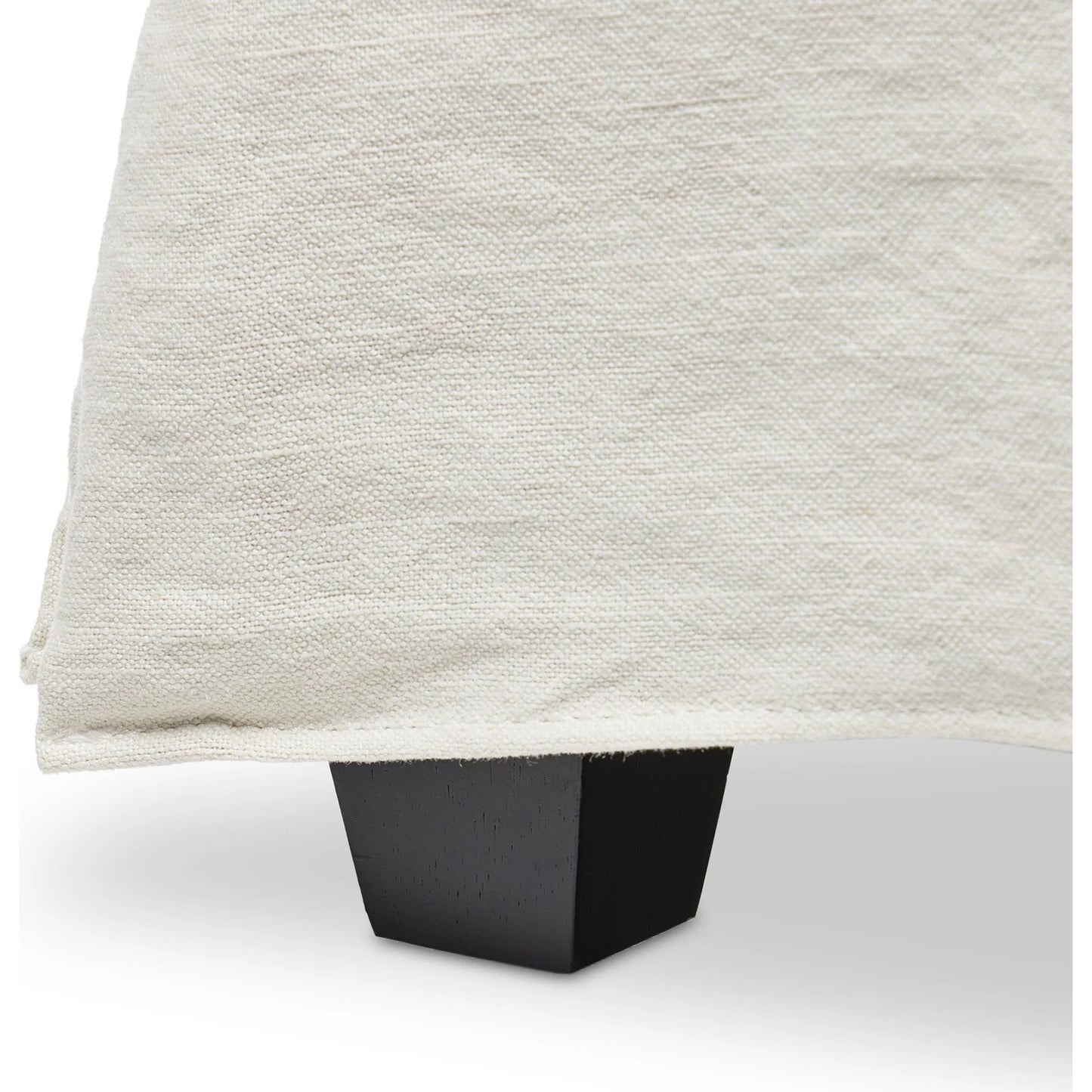 017 SI-2320168,SI-2320169 | Closeup | Meryl Slipcover Bed by Four Hands in broadway mist, black parawood. Made from 100% flax/linen, solid parawood in a unique style.