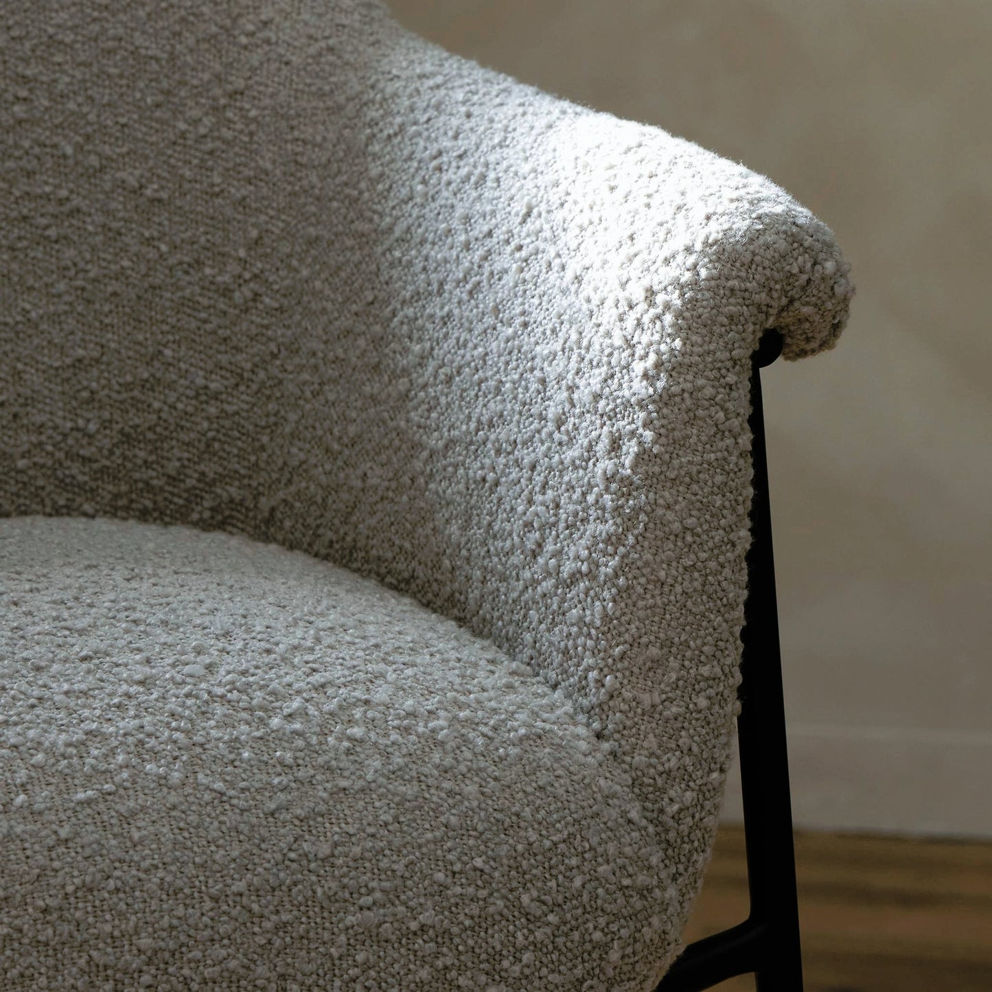013 SI-2158510 | Closeup | Suerte Bar + Counter Stool by Four Hands in knoll sand, matte ebony and knoll sand. Made from 95% polyester, 5% acrylic, iron, 100% polyester in a modern style.