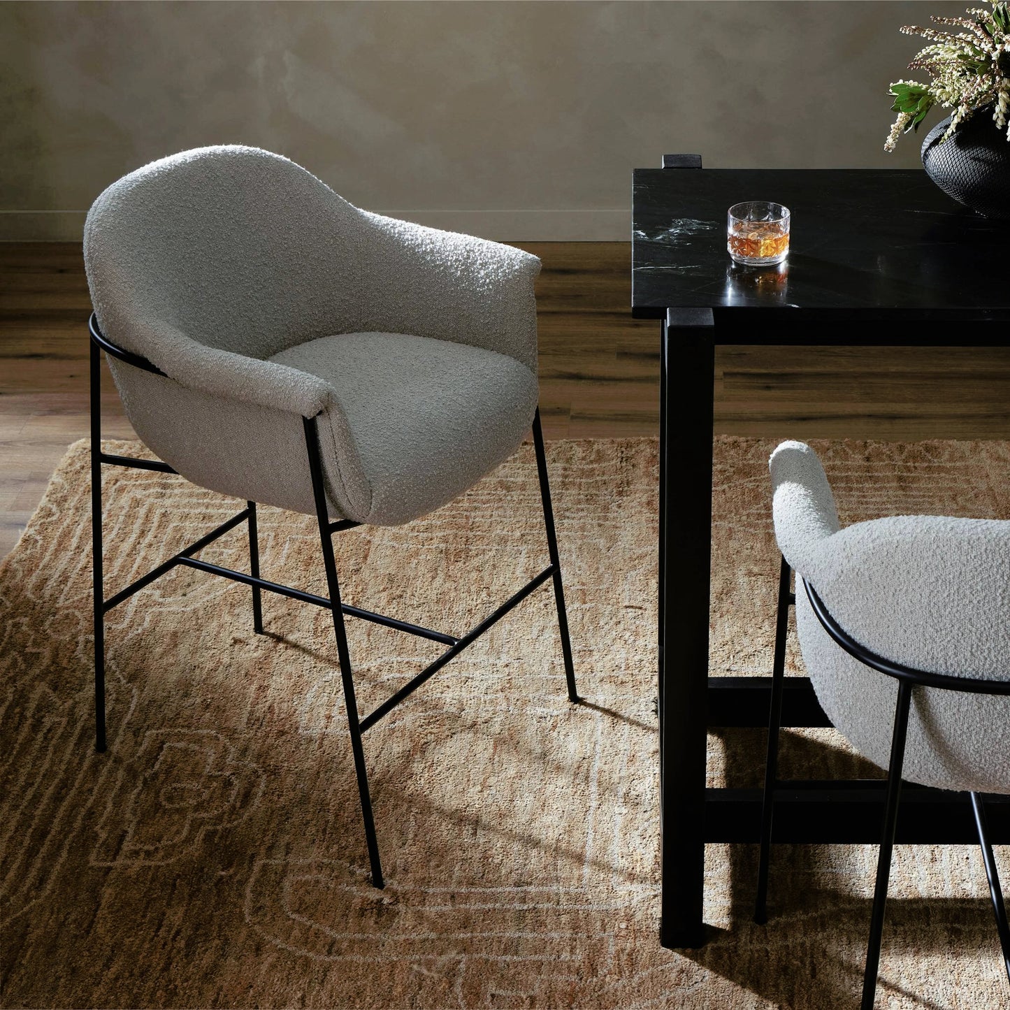 014 SI-2158510 | Lifestyle | Suerte Bar + Counter Stool by Four Hands in knoll sand, matte ebony and knoll sand. Made from 95% polyester, 5% acrylic, iron, 100% polyester in a modern style.