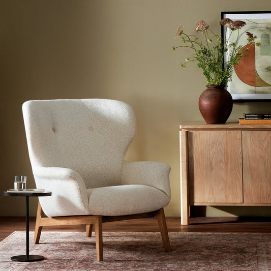 Lilith Chair by Four Hands in harrow ivory and lamont nettlewood. Made from 47% polyester, 18% viscose, 30% acrylic, 5% linen, solid nettlewood, 100% polyester in a modern style.