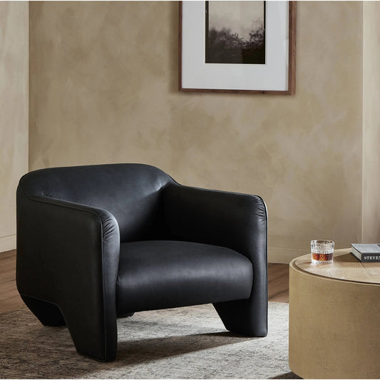 Daria Chair by Four Hands in eucapel black. Made from top grain leather, poplar plywood, 100% polyester in a modern style.