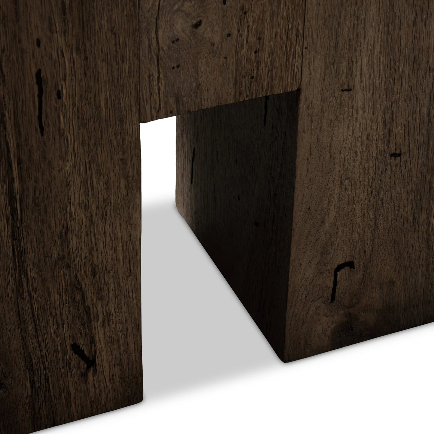 011 SI-2000875 | Closeup | Abaso Large Accent Bench by Four Hands in ebony rustic wormwood oak. Made from thick oak veneer, engineered hardwood in a modern style.