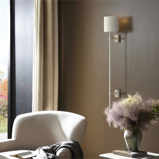 Maurice Sconce by Four Hands in matte white plaster, matte white iron. Made from iron in a unique style.