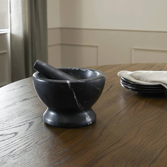 Arman Mortar and Pestle by Four Hands in polished black marble. Made from solid marble in a unique style.