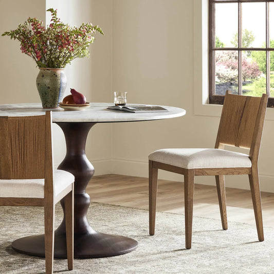 Selene Dining Chair by Four Hands in dover crescent, aged oak, natural paper cord. Made from 71% viscose (rayon), 17% polyester, 12% flax/linen, solid oak, rush in a transitional style.