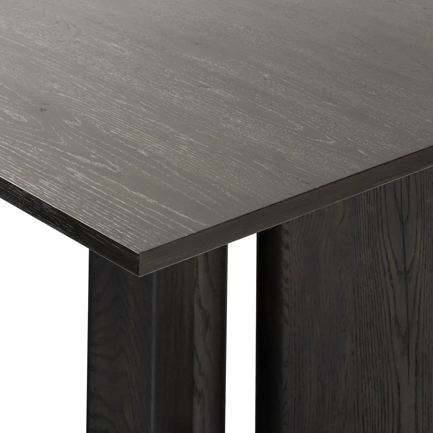 004 SI-2320129 | Closeup | Huxley Dining Table by Four Hands in smoked black veneer. Made from thick oak veneer, solid oak in a unique style.